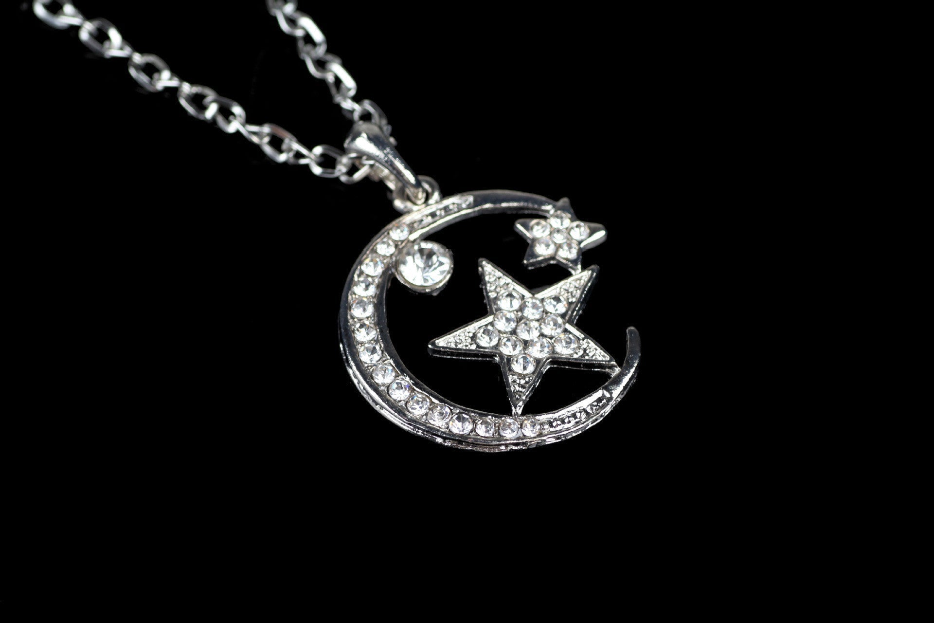 UPSCALE FASHION INLAID CRYSTAL MOON AND STARS PENDANT NECKLACE