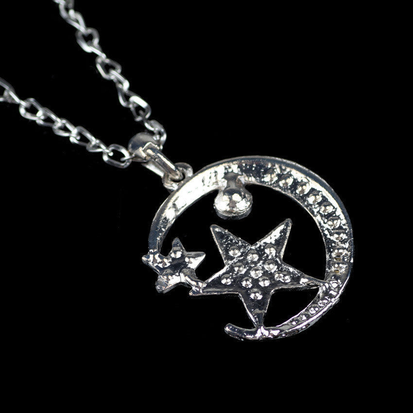 UPSCALE FASHION INLAID CRYSTAL MOON AND STARS PENDANT NECKLACE