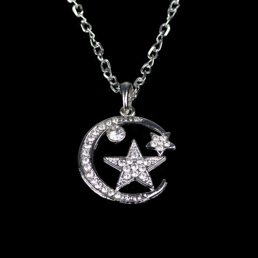 UPSCALE FASHION INLAID CRYSTAL MOON AND STARS PENDANT NECKLACE