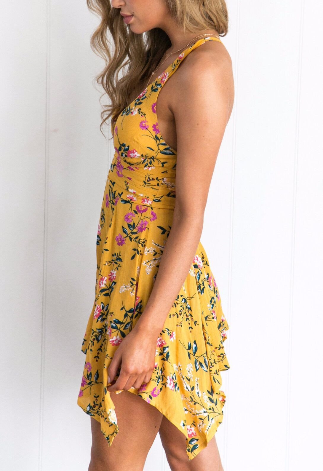 Fashion Sexy V-neck Condole Irregular Printed Jumpsuit
