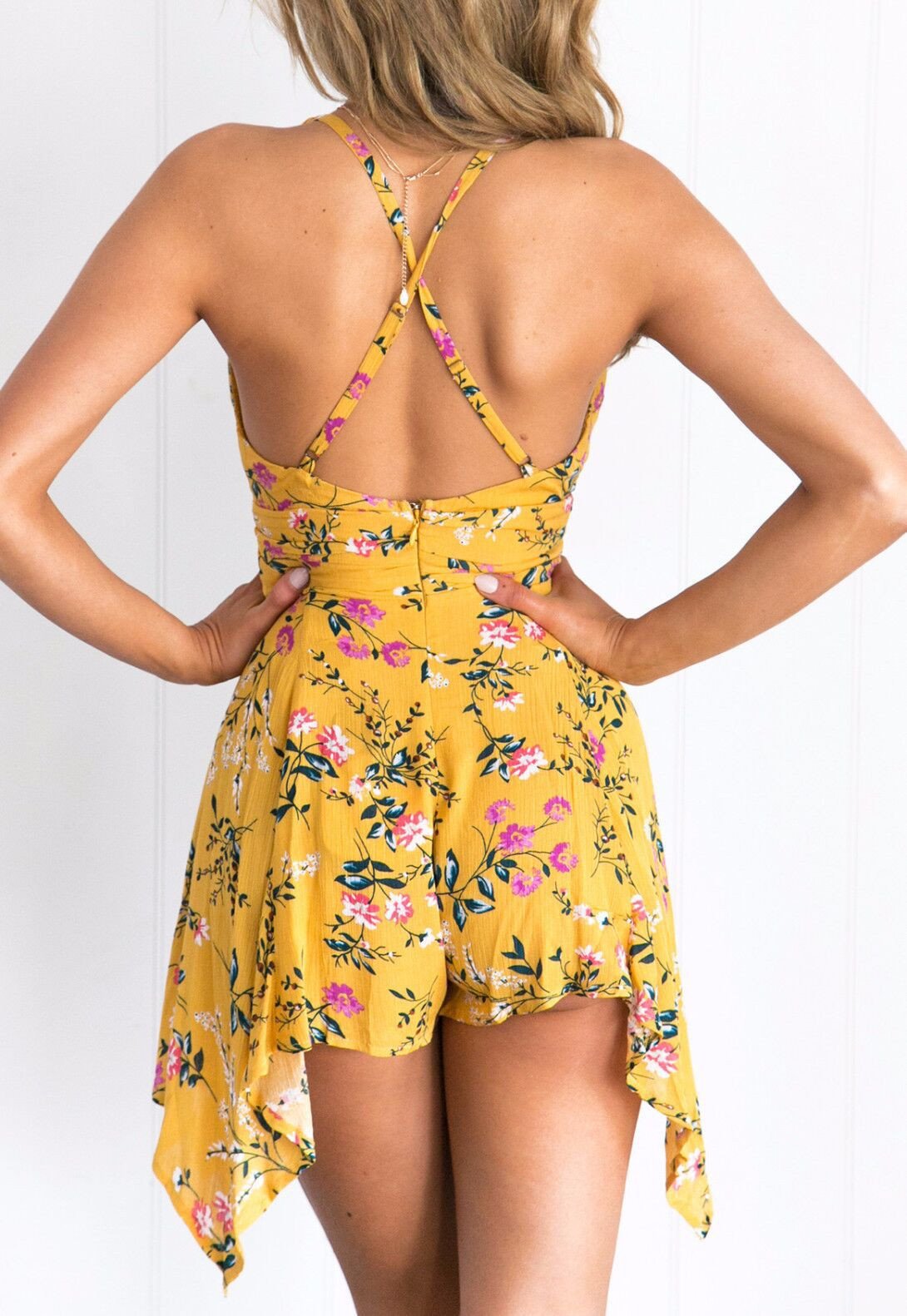 Fashion Sexy V-neck Condole Irregular Printed Jumpsuit