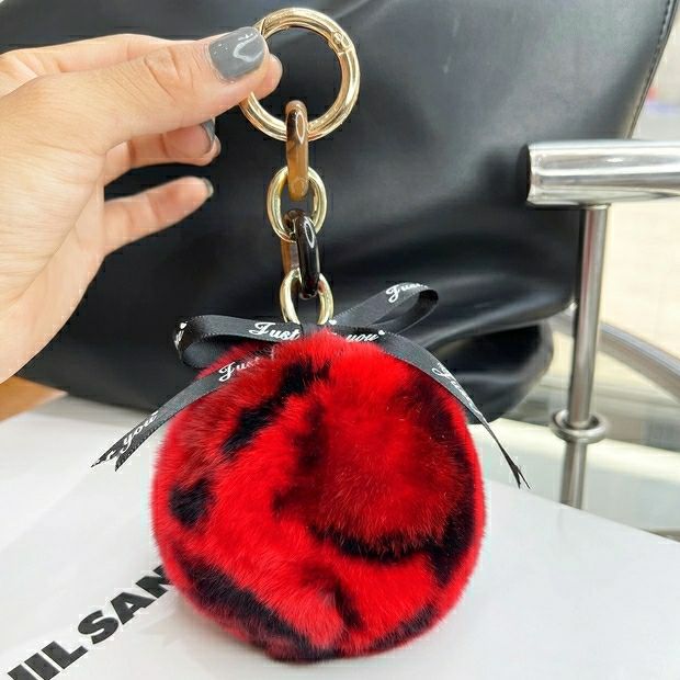 REAL SOWBUCK HAIR LEOPARD PRINT HAIR BALL KEYCHAIN AND HAIR BALL HANDBAG ACCESSORY