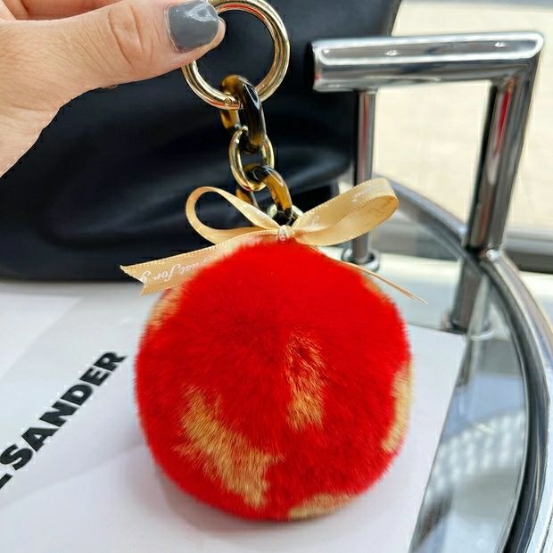 REAL SOWBUCK HAIR LEOPARD PRINT HAIR BALL KEYCHAIN AND HAIR BALL HANDBAG ACCESSORY