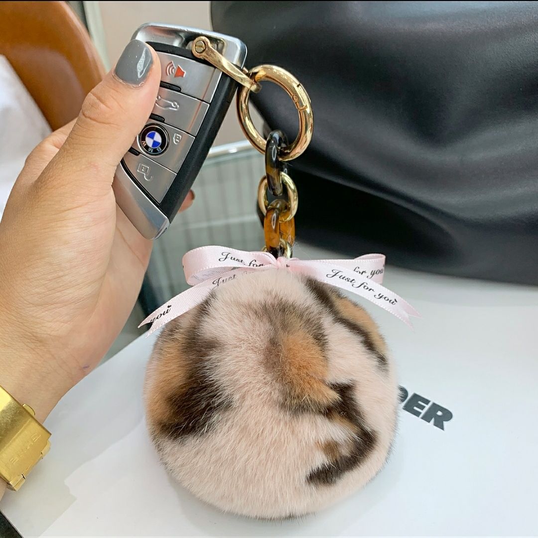 REAL SOWBUCK HAIR LEOPARD PRINT HAIR BALL KEYCHAIN AND HAIR BALL HANDBAG ACCESSORY