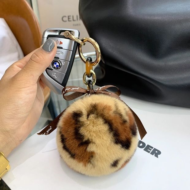 REAL SOWBUCK HAIR LEOPARD PRINT HAIR BALL KEYCHAIN AND HAIR BALL HANDBAG ACCESSORY