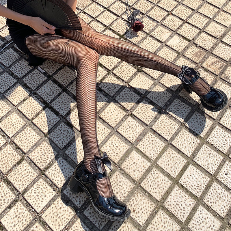 FASHION LONG BOW JK BIG GRID HOLLOWED-OUT PANTYHOSE