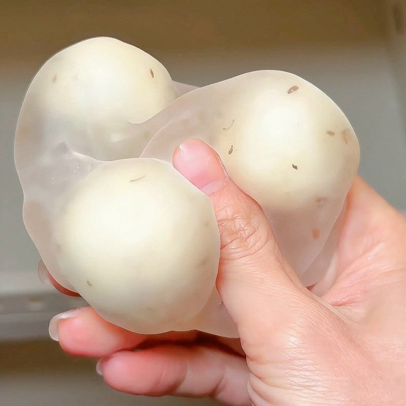BURST-FILLING CRUNCHY SQUISHY BALL